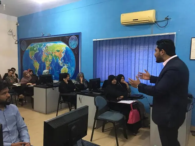 Usman Saeed answering trainee questions at a Kamyab Jawan Programme session